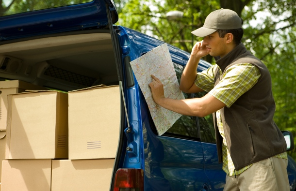 Delivery Driver Looking at Map